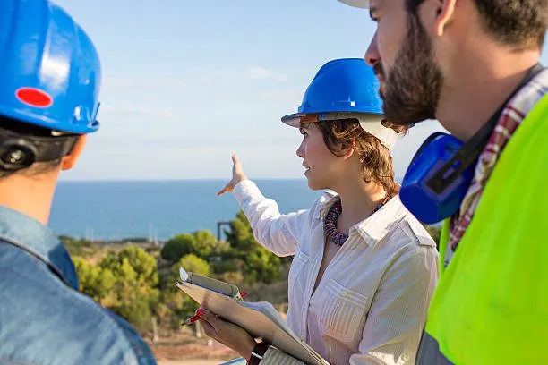 SuperStone Homes team reviewing plans on site